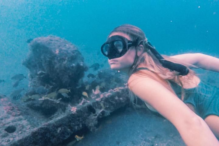 a person swimming in the water