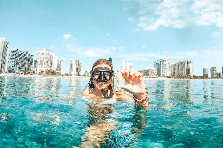 a person swimming in a body of water