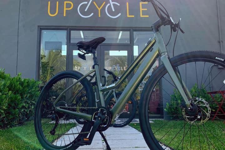 a bicycle parked on the side of a building