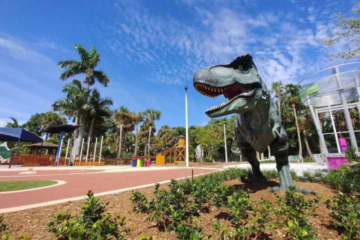 a statue of a person in a garden