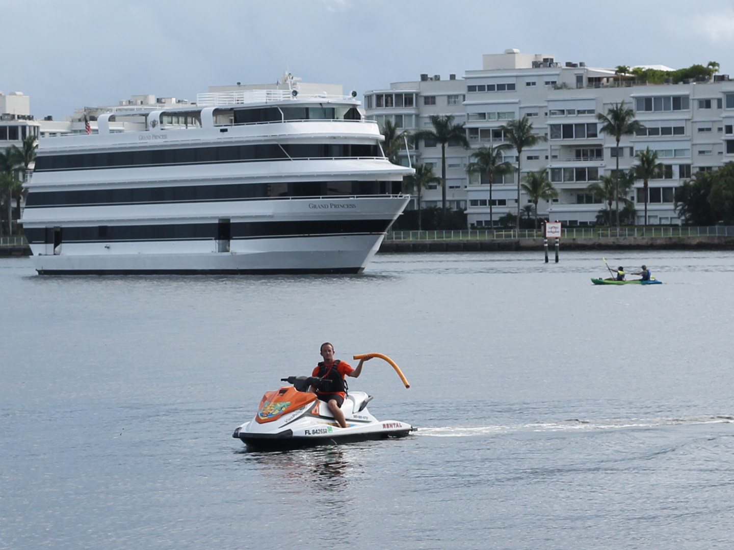 a small boat in a large body of water