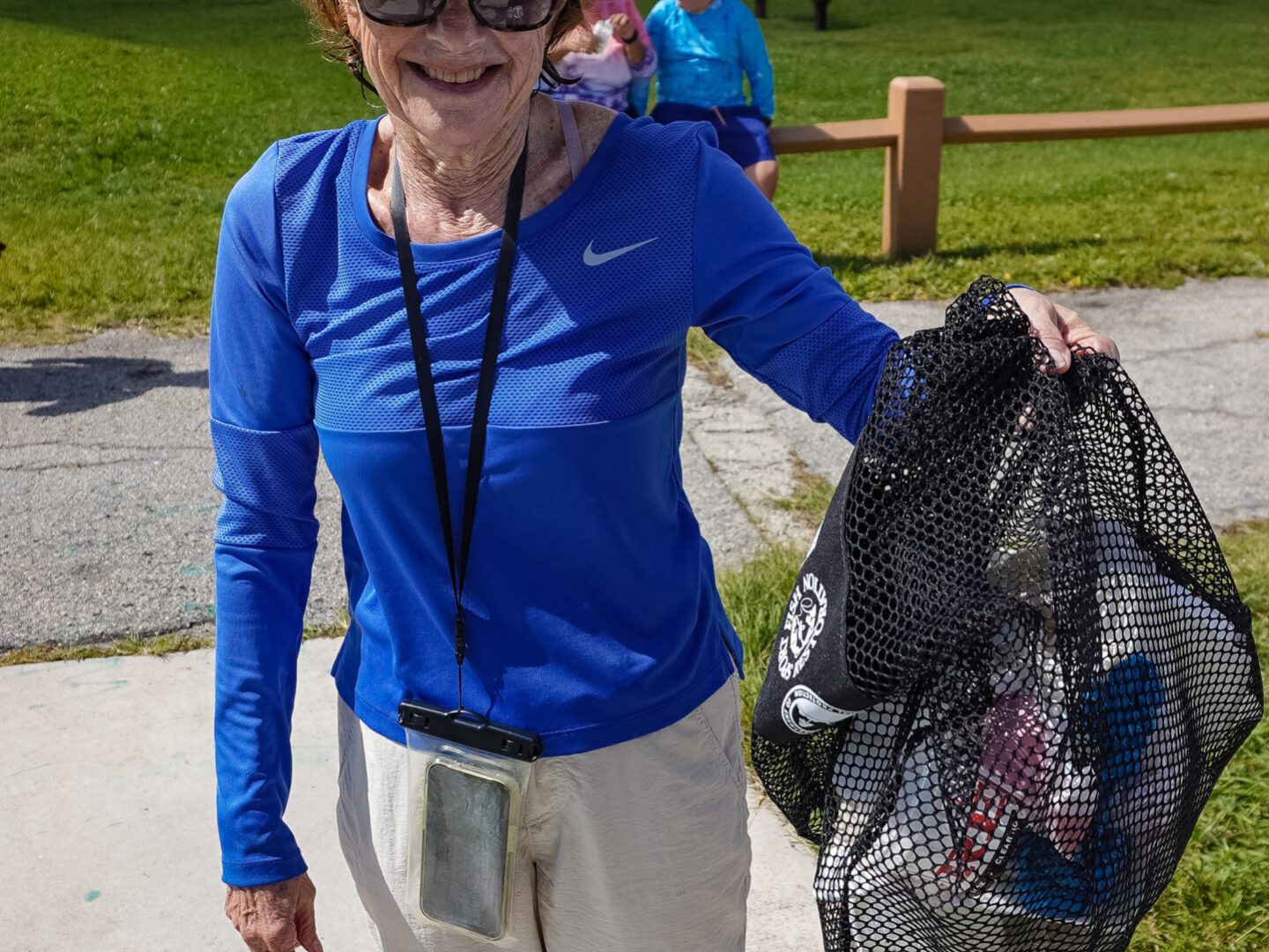 a person that is standing in the grass
