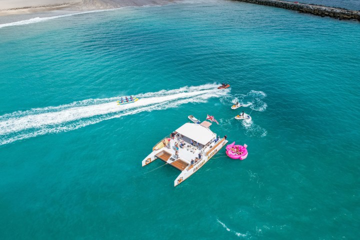 a pool next to a body of water