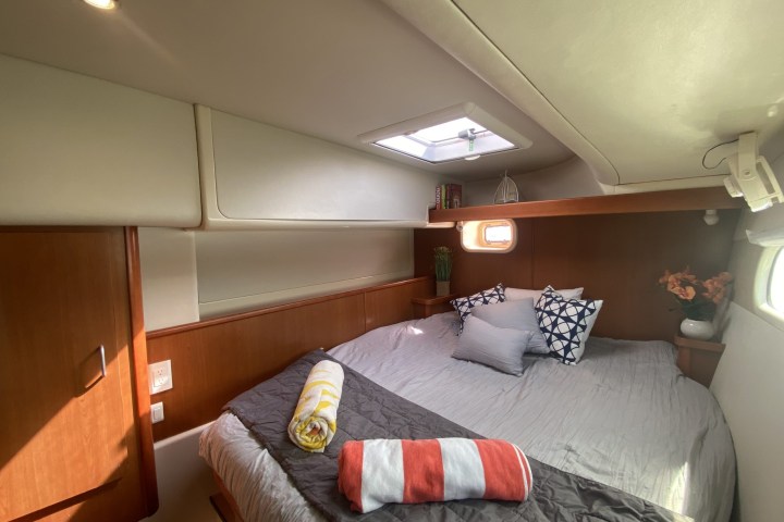 a bedroom with a bed in a room