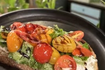 a pan filled with meat and vegetables