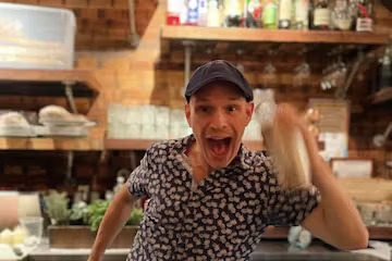 a woman sitting on a counter