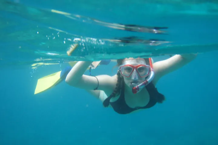 a person swimming in the water