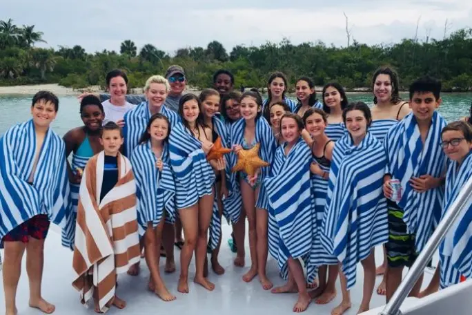 a group of people posing for the camera