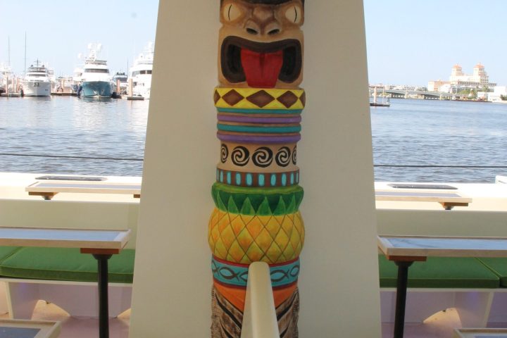 a chair sitting in front of water