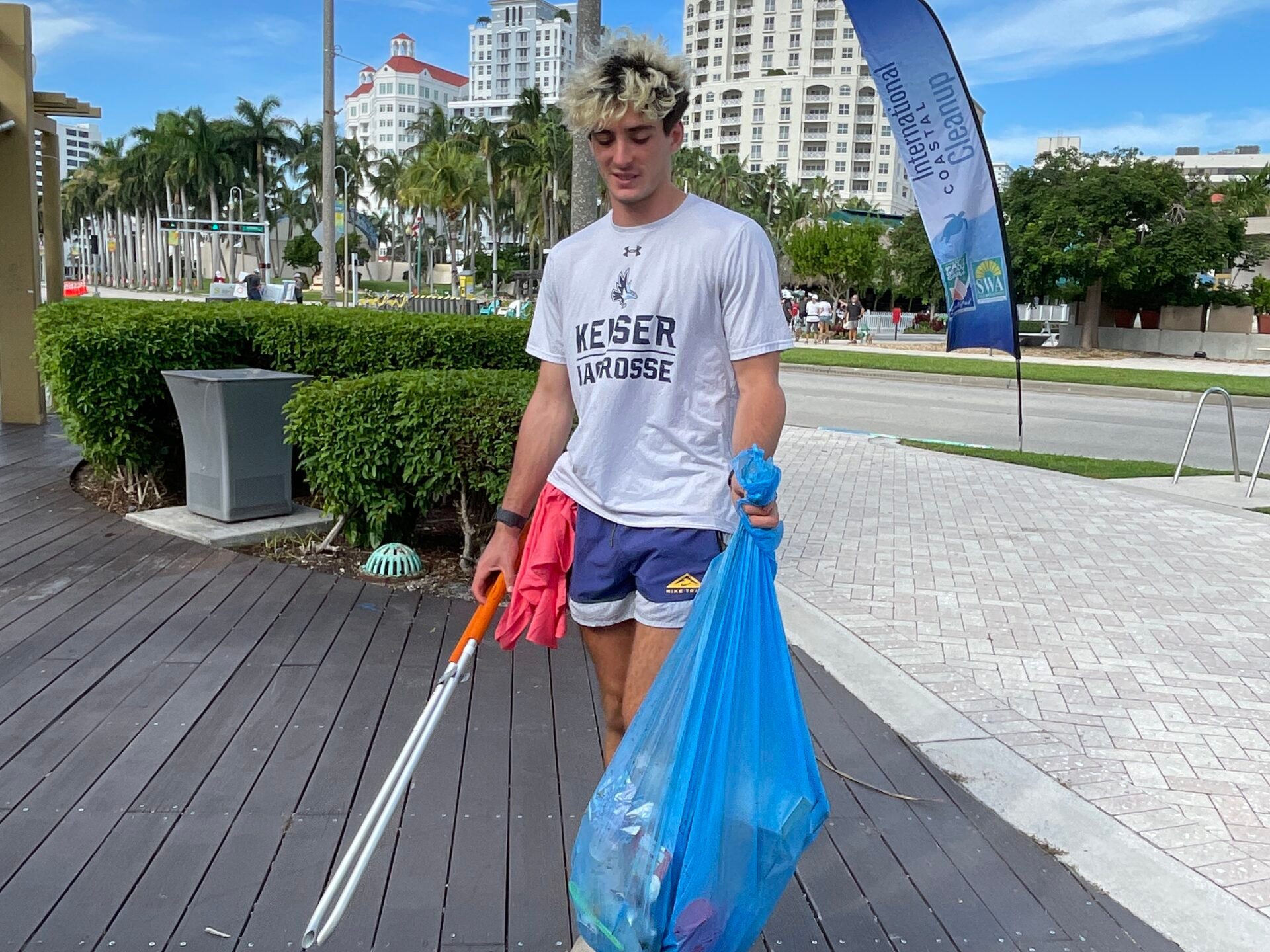 a man standing on a sidewalk
