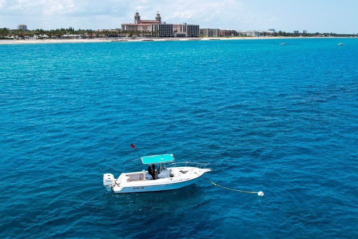 a small boat in a large body of water