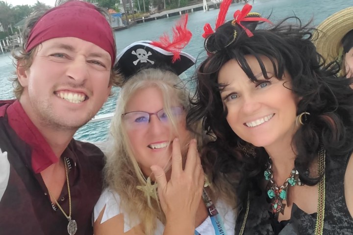 a close up of a couple of people posing for the camera