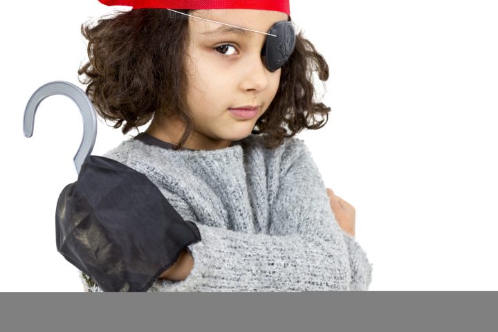 a little boy wearing a hat