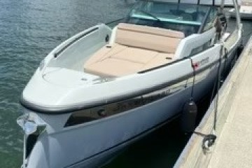 a boat parked next to a body of water