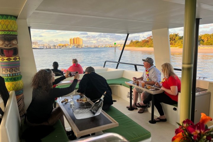 a group of people sitting at a table