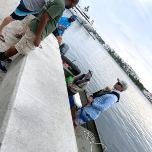 a person doing a trick on a skate board in the snow