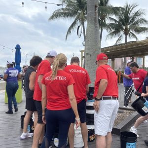 a group of people standing in front of a crowd