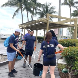 a group of people on a sidewalk