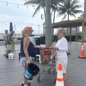 a group of people walking down a street