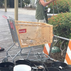 a man standing in front of a building