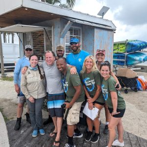 a group of people standing in front of a building