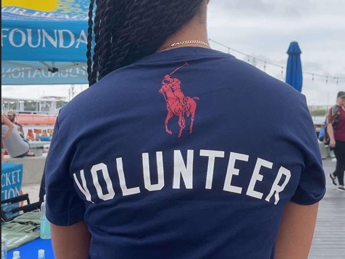 a man standing in front of a crowd