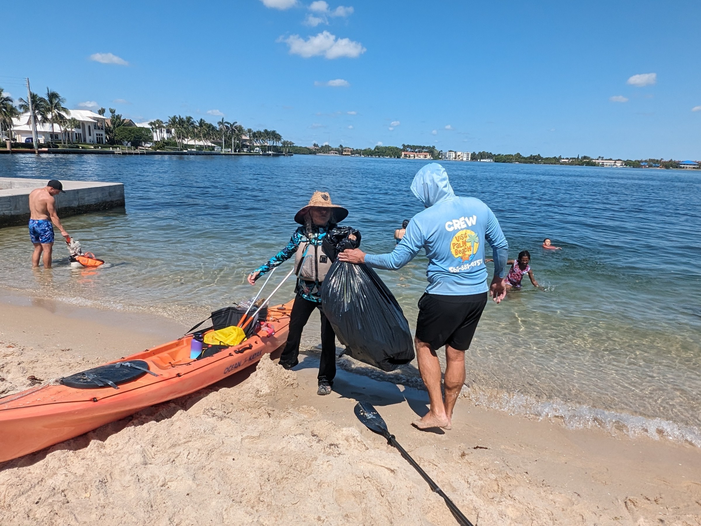 a group of people on a beach