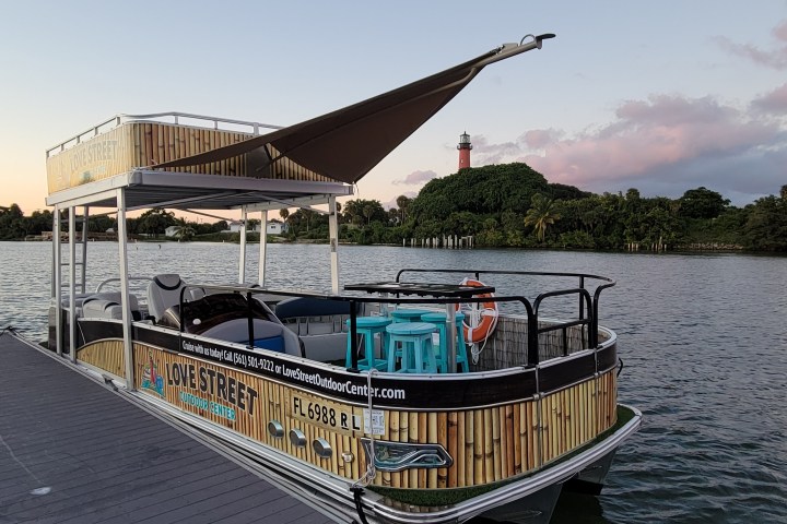 a boat is docked next to a body of water