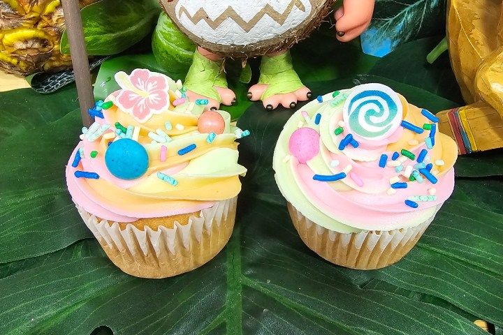 a cake with fruit on top of a table